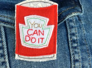 You can do it brooch – red